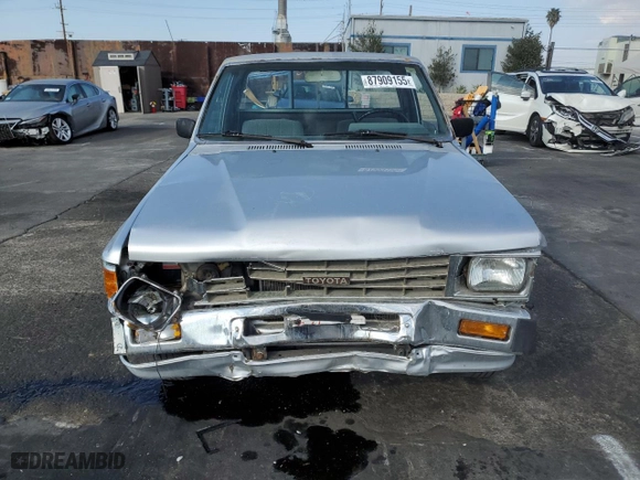 1986 Toyota Pickup with VIN JT4RN55D0G0213834, listed as a Copart auction lot 87909155 with NaN miles and Salvage Title. Bid and sale history available at carsss.com. Image 5.