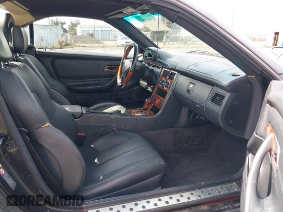 2003 Mercedes-Benz SLK 320 with VIN WDBKK65F63F282132, listed as a IAAI auction lot 41965580 with 166,115 mi miles and . Bid and sale history available at DreamBid. Image 5.