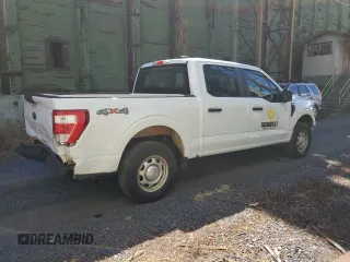 2023 Ford F-150 XL with VIN 1FTEW1EBXPKE80986, listed as a Copart auction lot 60357284 with 10,525 mi miles and Salvage Title. Bid and sale history available at carsss.com. Image 3.