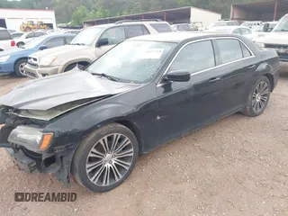2013 Chrysler 300 with VIN 2C3CCABG4DH712280, listed as a IAAI auction lot 41471254 with 213,280 mi miles. Bid and sale history available at carsss.com. Image 2.