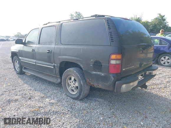 2003 Chevrolet Suburban LT z VIN 1GNEC16Z13J216552, wystawiony jako IAAI lot #40193670 z przebiegiem 235 840 mil mil oraz . Historia ofert i sprzedaży dostępna na DreamBid. Obrazek 3.