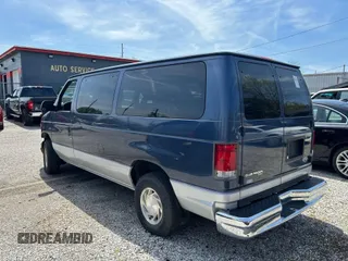 1998 Ford Econoline Passenger XL with VIN 1FMRE11L6WHB65841, listed as a IAAI auction lot 42123953 with 63,138 mi miles. Bid and sale history available at carsss.com. Image 3.