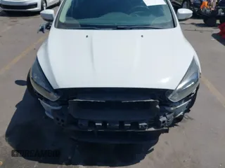 2017 Ford Focus SE with VIN 1FADP3F24HL232527, listed as a IAAI auction lot 42110702 with 95,327 mi miles and . Bid and sale history available at DreamBid. Image 13.