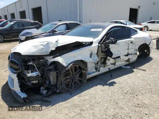 2023 BMW M8 Competition z VIN WBSAE0C04PCL03625, wystawiony jako Copart lot #52190975 z przebiegiem Nie podano mil oraz Nie do naprawy. Historia ofert i sprzedaży dostępna na DreamBid. Obrazek 1.