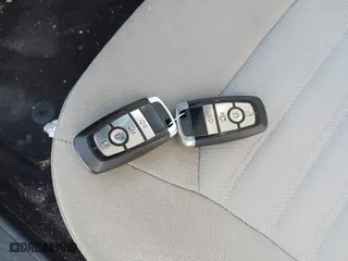 2018 Ford Fusion Hybrid S with VIN 3FA6P0UU8JR244912, listed as a IAAI auction lot 41742940 with 65,885 mi miles. Bid and sale history available at carsss.com. Image 11.