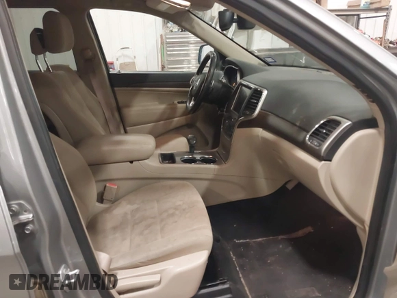 2015 Jeep Grand Cherokee Laredo with VIN 1C4RJFAG4FC797069, listed as a IAAI auction lot 41435299 with 146,755 mi miles. Bid and sale history available at carsss.com. Image 5.