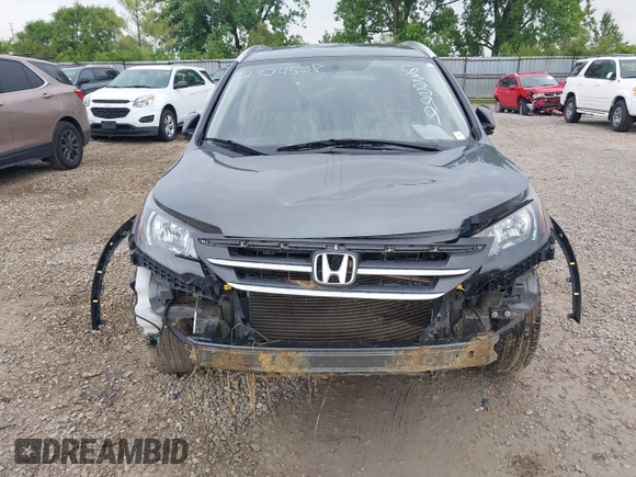 2013 Honda CR-V EX-L z VIN 2HKRM4H74DH632299, wystawiony jako IAAI lot #42324538 z przebiegiem 184 173 mil mil oraz . Historia ofert i sprzedaży dostępna na DreamBid. Obrazek 6.