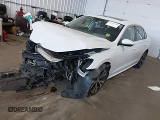 2021 Volkswagen Passat SE with VIN 1VWSA7A30MC014179, listed as a IAAI auction lot 42342358 with 77,535 mi miles and . Bid and sale history available at DreamBid. Image 17.