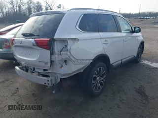 2016 Mitsubishi Outlander GT z VIN JA4JZ4AXXGZ010676, wystawiony jako IAAI lot #41527681 z przebiegiem 71 866 mil mil oraz . Historia ofert i sprzedaży dostępna na DreamBid. Obrazek 4.