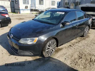 2014 Volkswagen Jetta SE with VIN 3VWD17AJXEM374051, listed as a Copart auction lot 50261485 with 138,282 mi miles and Salvage title. Bid and sale history available at DreamBid. Image 1.