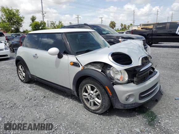 2012 MINI Hardtop with VIN WMWSU3C54CT186406, listed as a Copart auction lot 60940305 with 106,819 mi miles and Salvage title. Bid and sale history available at DreamBid. Image 4.