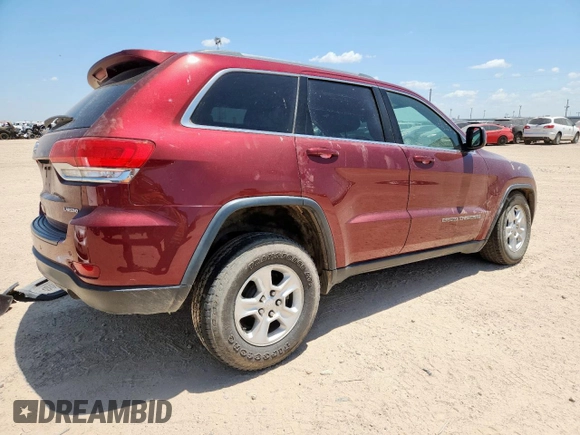2017 Jeep Grand Cherokee Laredo with VIN 1C4RJFAG7HC693789, listed as a Copart auction lot 61827925 with 143,019 mi miles and Salvage title. Bid and sale history available at DreamBid. Image 3.