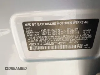 2021 BMW X1 sDrive28i with VIN WBXJG7C06M5T14235, listed as a IAAI auction lot 42021762 with 53,384 mi miles and . Bid and sale history available at DreamBid. Image 9.
