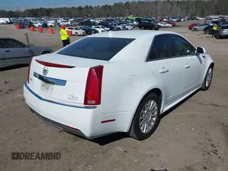 2011 Cadillac CTS Luxury with VIN 1G6DE5EY5B0119957, listed as a IAAI auction lot 41642172 with 228,401 mi miles and . Bid and sale history available at DreamBid. Image 4.