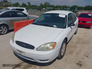 2006 Ford Taurus SE with VIN 1FAHP532X6A257510, listed as a IAAI auction lot 41892422 with 130,633 mi miles. Bid and sale history available at carsss.com. Image 2.