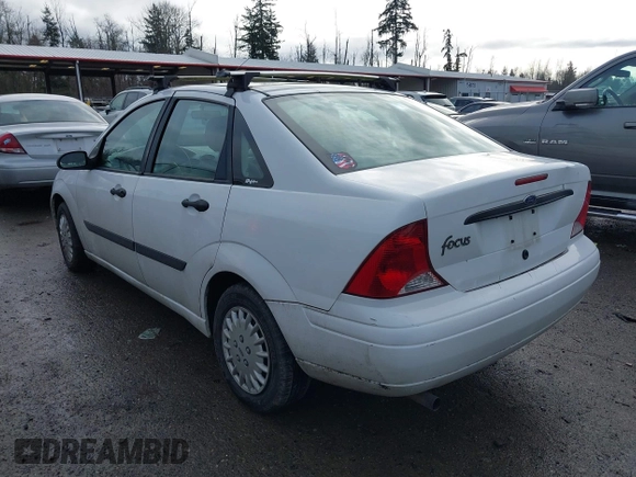 2003 Ford Focus LX with VIN 1FAFP33P73W156382, listed as a IAAI auction lot 41591885 with 174,169 mi miles and . Bid and sale history available at carsss.com. Image 3.