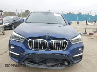 2018 BMW X1 xDrive28i z VIN WBXHT3C36J3H30583, wystawiony jako IAAI lot #42096329 z przebiegiem 43 232 mil mil oraz . Historia ofert i sprzedaży dostępna na DreamBid. Obrazek 13.