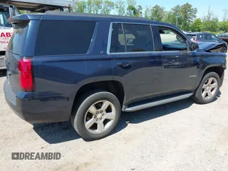 2020 Chevrolet Tahoe LT with VIN 1GNSKBKC6LR239081, listed as a IAAI auction lot 42298842 with 125,328 mi miles and . Bid and sale history available at DreamBid. Image 4.