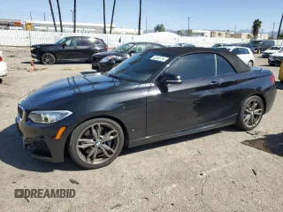 2015 BMW 2 Series M235i with VIN WBA1M1C56FV393730, listed as a Copart auction lot 45348734 with 59,231 mi miles and Salvage Title. Bid and sale history available at carsss.com. Image 1.