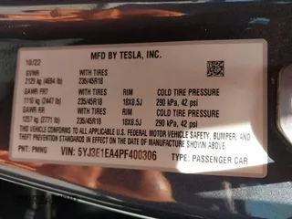 2023 Tesla Model 3 with VIN 5YJ3E1EA4PF400306, listed as a IAAI auction lot 42398603 with 18,551 mi miles and . Bid and sale history available at DreamBid. Image 9.