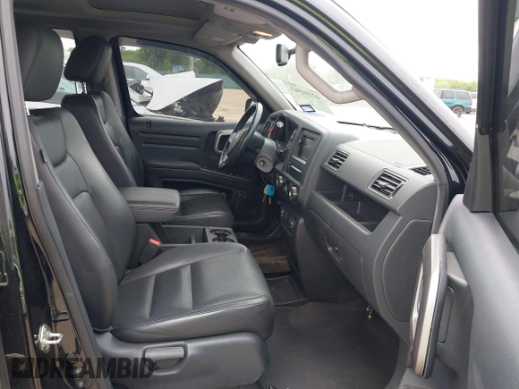 2013 Honda Ridgeline RTL with VIN 5FPYK1F56DB003473, listed as a IAAI auction lot 42101963 with 170,375 mi miles and . Bid and sale history available at DreamBid. Image 5.