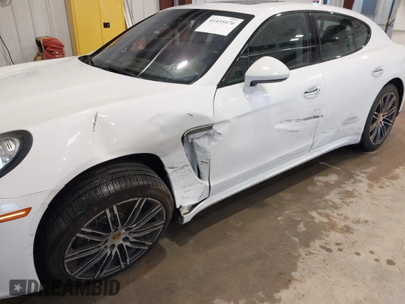 2016 Porsche Panamera 4 z VIN WP0AA2A71GL000087, wystawiony jako IAAI lot #41435476 z przebiegiem 103 537 mil mil oraz . Historia ofert i sprzedaży dostępna na DreamBid. Obrazek 6.