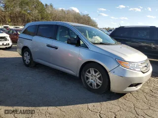 2012 Honda Odyssey LX with VIN 5FNRL5H26CB019627, listed as a Copart auction lot 87094684 with 214,563 mi miles and Salvage Title. Bid and sale history available at carsss.com. Image 4.
