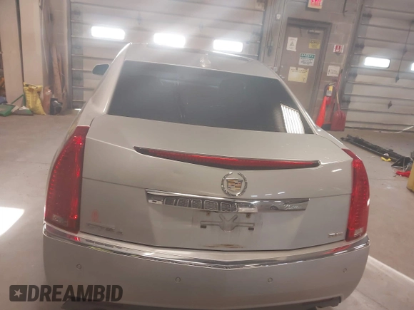 2012 Cadillac CTS Premium z VIN 1G6DS5E33C0139591, wystawiony jako IAAI lot #41985026 z przebiegiem 151 810 mil mil oraz . Historia ofert i sprzedaży dostępna na DreamBid. Obrazek 16.