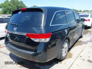 2016 Honda Odyssey EX-L with VIN 5FNRL5H61GB089853, listed as a IAAI auction lot 42019081 with 81,317 mi miles and . Bid and sale history available at DreamBid. Image 4.