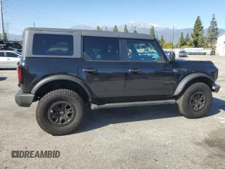 2024 Ford Bronco Wildtrak z VIN 1FMEE2BP1RLA54539, wystawiony jako Copart lot #46310905 z przebiegiem 12 545 mil mil oraz Szkody całkowita. Historia ofert i sprzedaży dostępna na DreamBid. Obrazek 3.