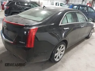 2013 Cadillac ATS with VIN 1G6AG5RX5D0172403, listed as a IAAI auction lot 41362636 with 117,329 mi miles and . Bid and sale history available at DreamBid. Image 4.