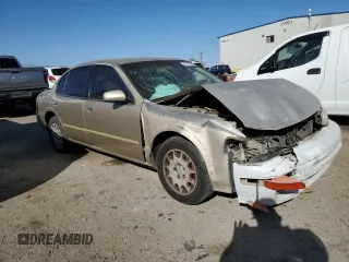1998 Nissan Maxima GXE with VIN JN1CA21D0WM903051, listed as a Copart auction lot 47821445 with 156,748 mi miles and Salvage title. Bid and sale history available at DreamBid. Image 4.