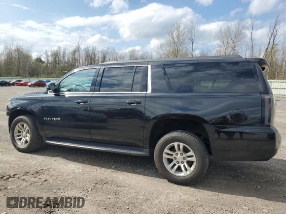 2015 Chevrolet Suburban LT with VIN 1GNSKJKC9FR510682, listed as a Copart auction lot 55427315 with 202,592 mi miles and Salvage Title. Bid and sale history available at DreamBid. Image 2.