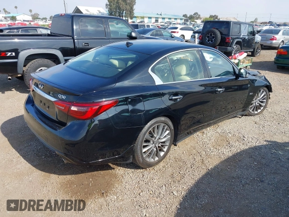 2019 Infiniti Q50 Luxe with VIN JN1EV7AP8KM543395, listed as a IAAI auction lot 42418112 with 43,382 mi miles and . Bid and sale history available at DreamBid. Image 4.