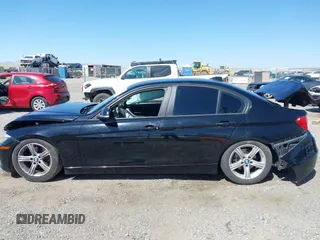2015 BMW 3 Series 320i with VIN WBA3B1C57FK138441, listed as a IAAI auction lot 42034649 with Not Provided miles. Bid and sale history available at carsss.com. Image 13.