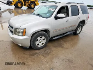 2007 Chevrolet Tahoe LTZ with VIN 1GNFC13J77R147392, listed as a Copart auction lot 63675605 with 246,083 mi miles and Salvage title. Bid and sale history available at DreamBid. Image 1.