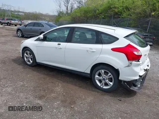 2014 Ford Focus SE with VIN 1FADP3K28EL291260, listed as a IAAI auction lot 42029753 with 98,686 mi miles. Bid and sale history available at carsss.com. Image 3.