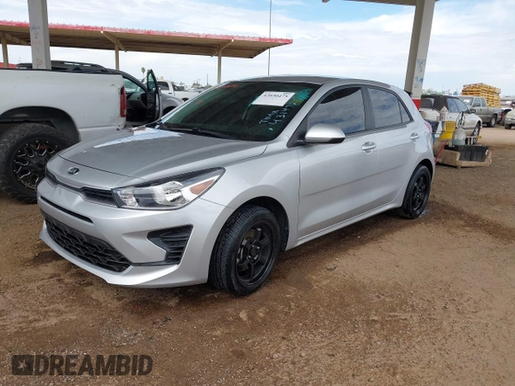 2021 Kia Rio S with VIN 3KPA25ADXME431472, listed as a IAAI auction lot 42030475 with 62,279 mi miles and . Bid and sale history available at DreamBid. Image 2.