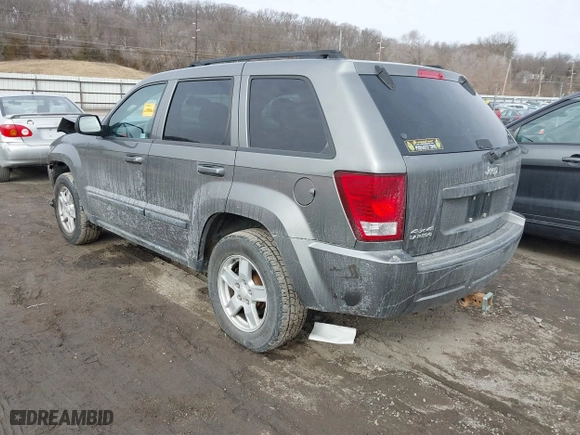 2007 Jeep Grand Cherokee Laredo with VIN 1J8GR48K57C556517, listed as a IAAI auction lot 41534166 with 158,914 mi miles. Bid and sale history available at carsss.com. Image 3.