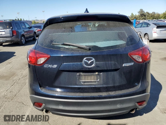 2015 Mazda CX-5 Sport with VIN JM3KE2BEXF0483141, listed as a Copart auction lot 59134105 with 71,727 mi miles and Salvage title. Bid and sale history available at DreamBid. Image 6.