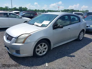 2011 Nissan Sentra 2.0 SR with VIN 3N1AB6AP2BL633668, listed as a IAAI auction lot 39652597 with 143,512 mi miles. Bid and sale history available at carsss.com. Image 16.