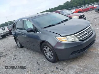 2011 Honda Odyssey EX with VIN 5FNRL5H44BB044428, listed as a IAAI auction lot 36981972 with 146,993 mi miles. Bid and sale history available at carsss.com. Image 1.