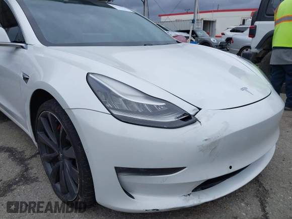 2020 Tesla Model 3 Performance z VIN 5YJ3E1EC4LF625109, wystawiony jako IAAI lot #41735149 z przebiegiem 95 010 mil mil oraz . Historia ofert i sprzedaży dostępna na DreamBid. Obrazek 6.