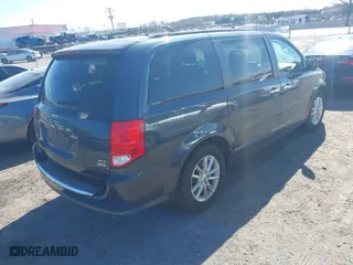 2014 Dodge Grand Caravan SXT with VIN 2C4RDGCGXER263302, listed as a IAAI auction lot 41893722 with 191,345 mi miles. Bid and sale history available at carsss.com. Image 4.