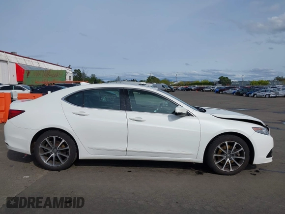 2015 Acura TLX V6 z VIN 19UUB2F30FA012923, wystawiony jako IAAI lot #42000107 z przebiegiem 101 133 mil mil oraz . Historia ofert i sprzedaży dostępna na DreamBid. Obrazek 13.