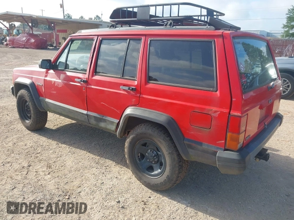 1996 Jeep Cherokee Sport with VIN 1J4FT68S4TL326973, listed as a IAAI auction lot 42744791 with 215,905 mi miles and . Bid and sale history available at DreamBid. Image 3.