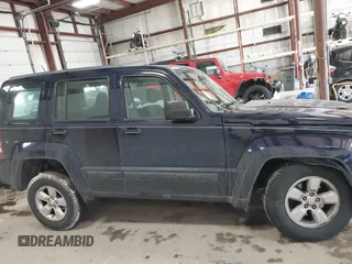 2012 Jeep Liberty Sport z VIN 1C4PJMAK9CW158308, wystawiony jako IAAI lot #41665502 z przebiegiem 125 595 mil mil oraz . Historia ofert i sprzedaży dostępna na DreamBid. Obrazek 13.