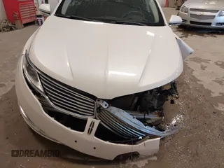 2016 Lincoln MKZ with VIN 3LN6L2JK0GR600486, listed as a IAAI auction lot 41943399 with 118,706 mi miles. Bid and sale history available at carsss.com. Image 6.