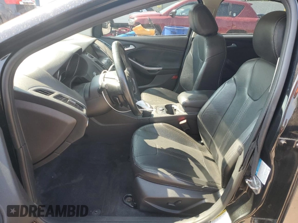 2014 Ford Focus Titanium with VIN 1FADP3N27EL251229, listed as a Copart auction lot 62201195 with 75,534 mi miles and Salvage title. Bid and sale history available at DreamBid. Image 7.