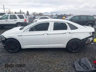 2019 Volkswagen Jetta GLI S z VIN 3VW6T7BU2KM202992, wystawiony jako IAAI lot #40896812 z przebiegiem 44 348 mil mil oraz . Historia ofert i sprzedaży dostępna na DreamBid. Obrazek 15.